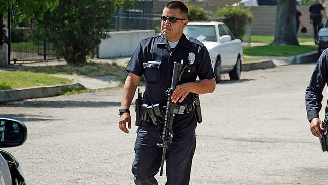 Homicide scene biohazard cleanup crew in protective equipment